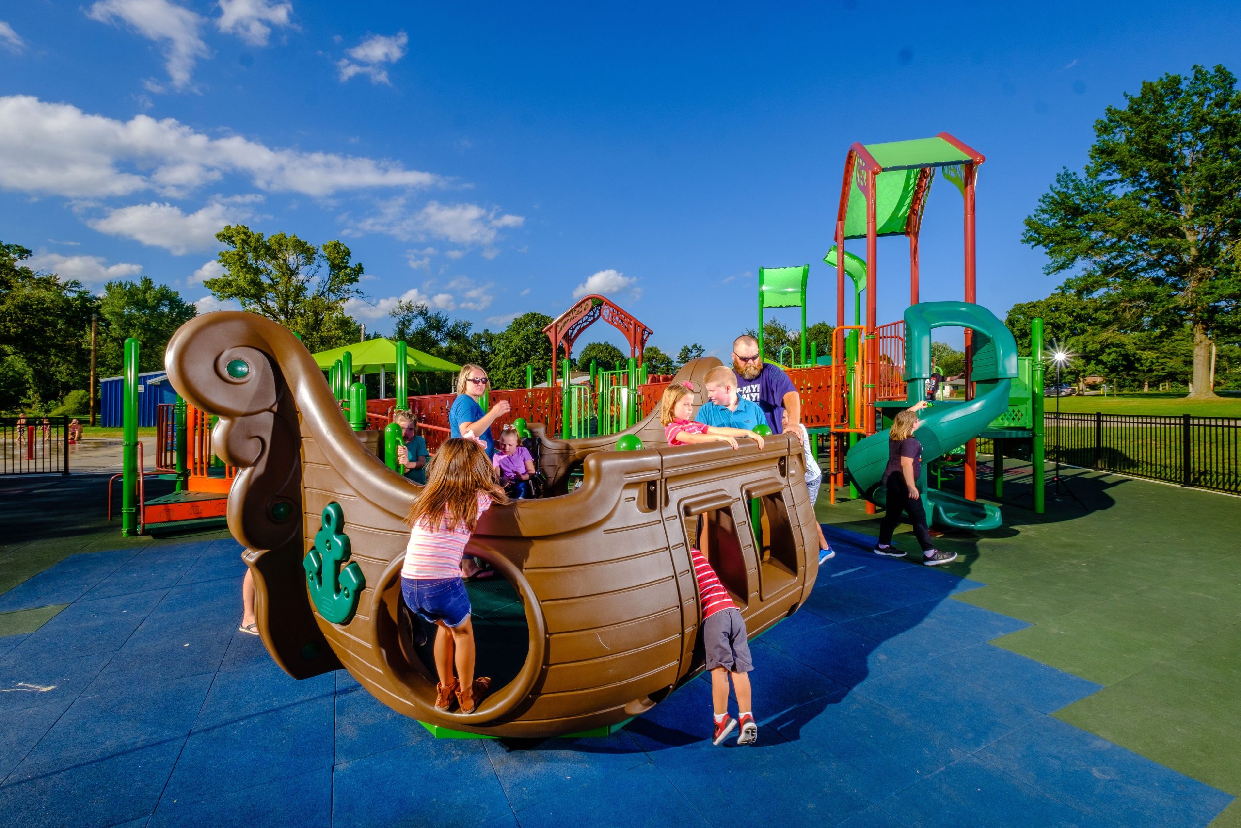 Inclusive boat playground structure